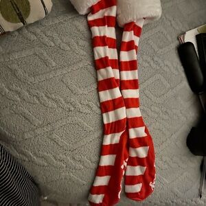 Cute thigh high naughty nice candy cane socks with faux fur top. Women size 8
